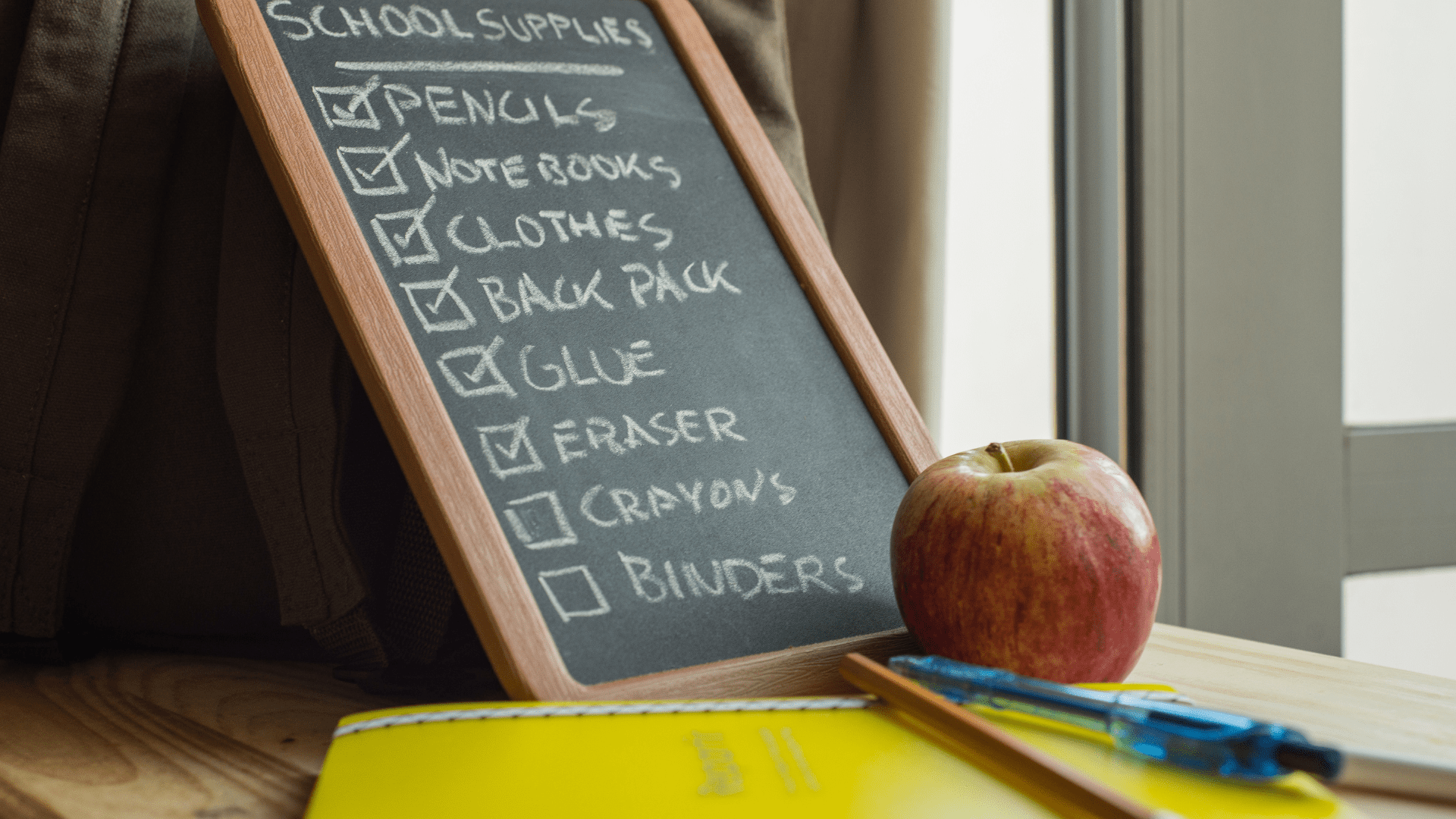 Chalkboard with a list of school supplies