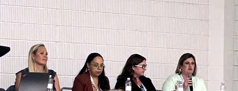 Educators participate in a panel discussion during a Teacher Leader Summit session.