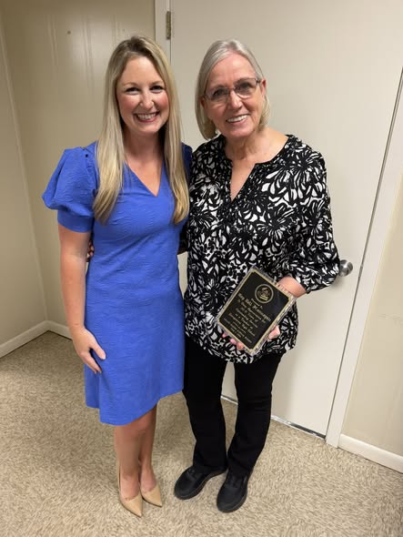 Gay Nell Hannegan is recognized by the Grant Parish School Board for 30.5 years of service.