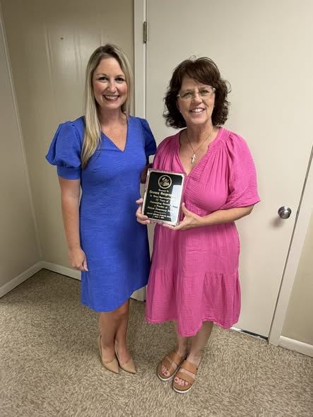 Tressa Daigrepont is recognized by the Grant Parish School Board for 33 years of service.